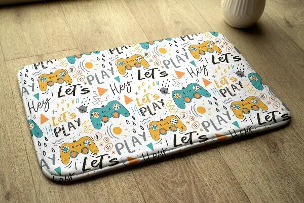 Tappeto Controller di gioco e scritta “Let's Play”.